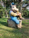 A large rhino statue in the ciater area of Ã¢â¬â¹Ã¢â¬â¹Indonesia, from a tree background